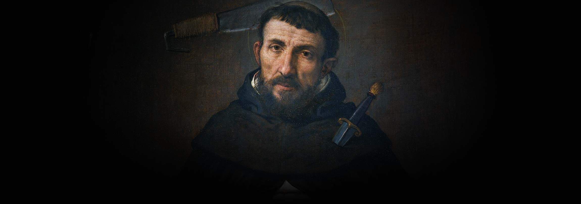 O que um facão está fazendo na cabeça deste santo?